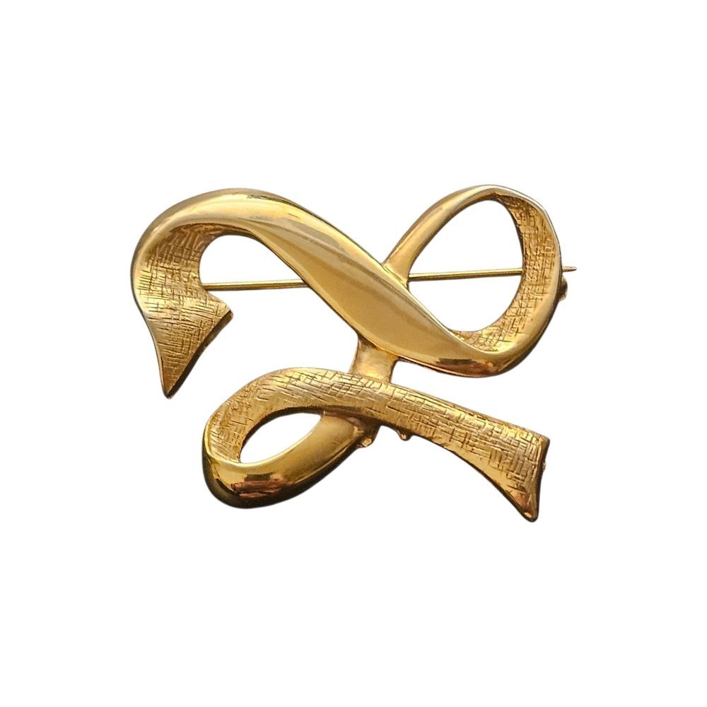 vintage gold-tone abstract ribbon or swirl brooch.